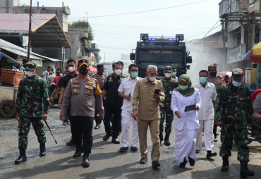 Polres dan Pemkab Batu Bara Gelar Penyemprotan Disinfektan Serentak di Titik Keramaian