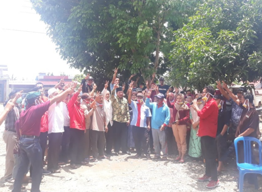 Cara Berpolitik Santun Rohidin-Rosjonsyah Buat Masyarakat Desa Tunggang Terkesan