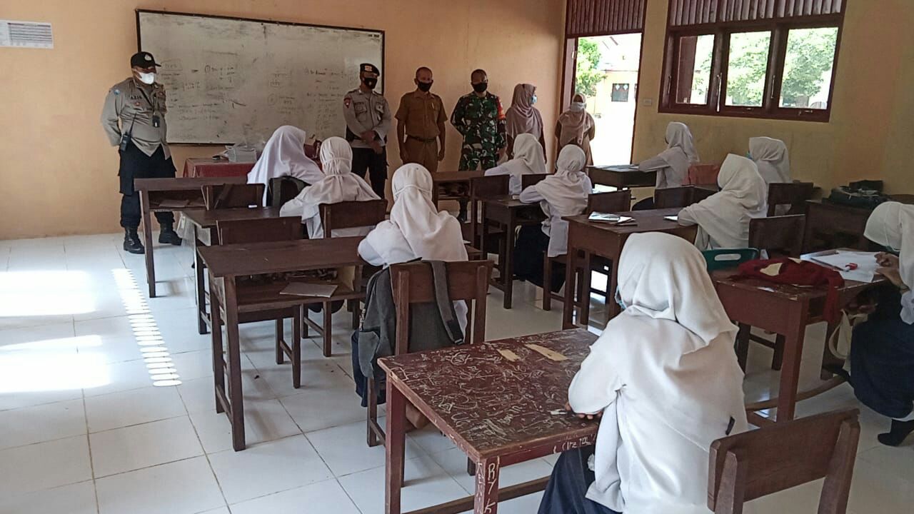Polda Aceh dan TNI Lakukan Sosialisasikan Protokol Kesehatan ke Sekolah