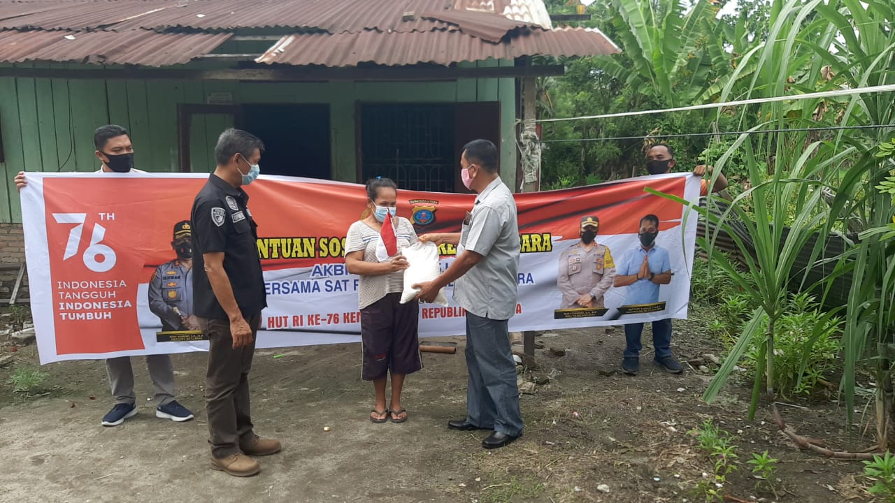 Personil Sat Reskim Salurkan Bantuan Kapolres Batu Bara