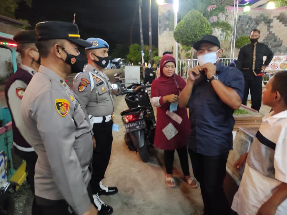 Polres Asahan Berikan Teguran dan Bagikan Masker Kepada Pengguna Jalan