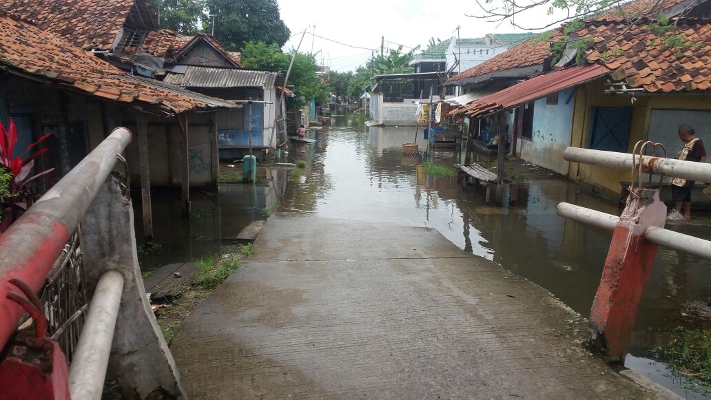 sebagian rumah warga kena banjir akibat hujan deras