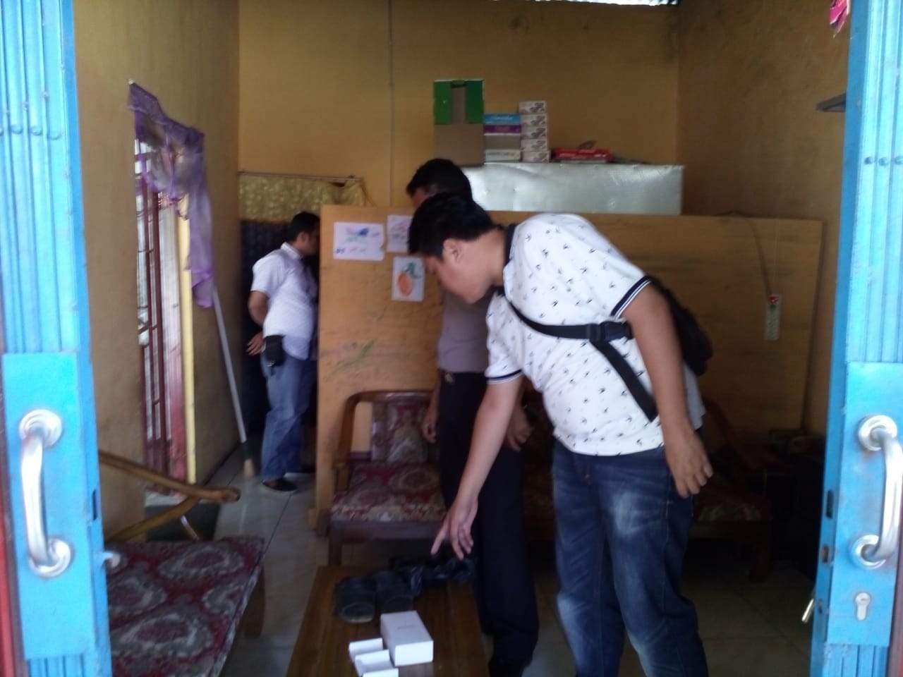 Tampak Pihak Kepolisian Lakukan Olah TKP