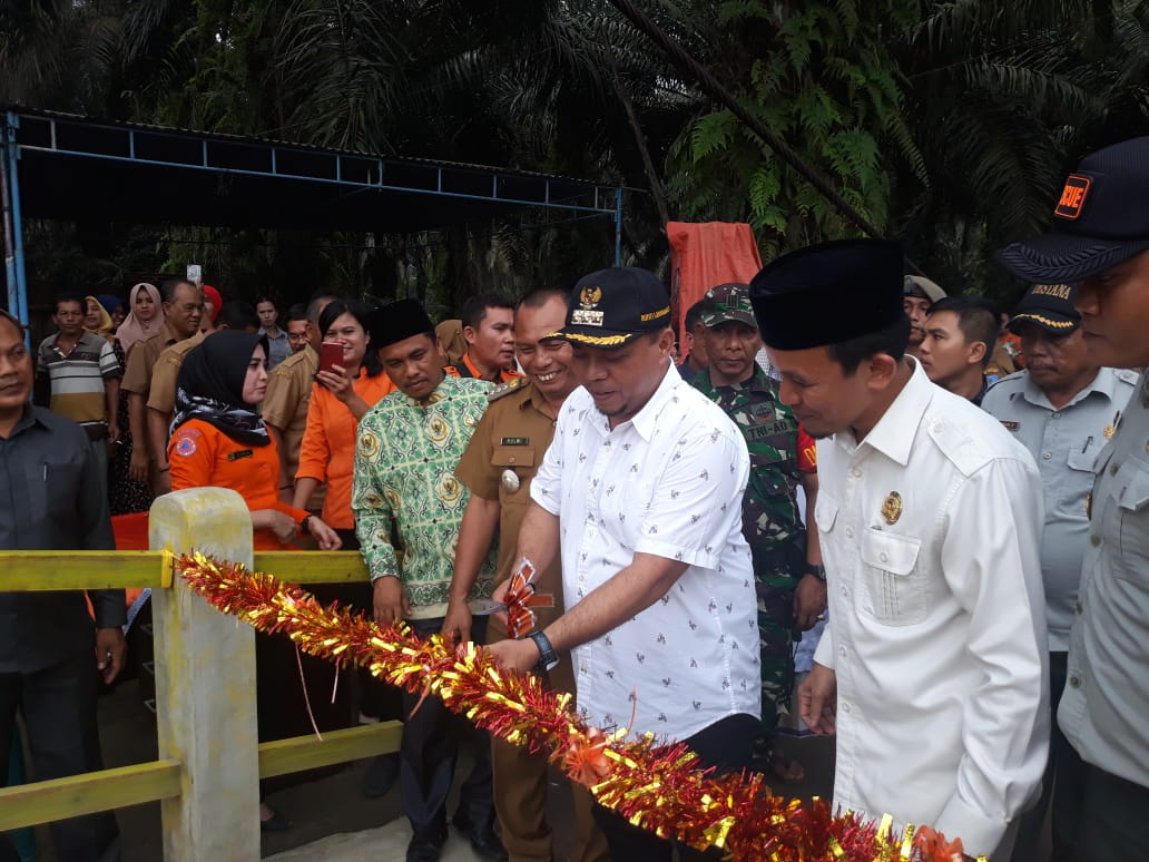 Kepala BPBD Labuhanbatu Fasilitasi Peresmian Jembatan Rambin