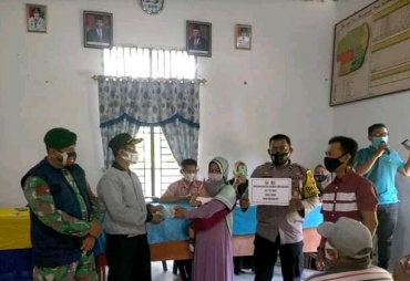 Personil Polsek Labuhan Ruku Lakukan Giat PPKM di Desa Sidomulio